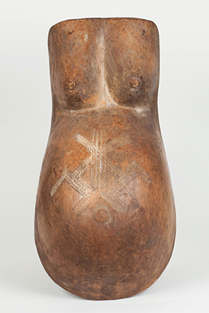 Makonde body mask showing a woman's breasts and pregnant belly