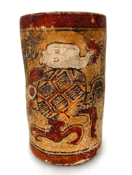 Ceramic cup with Maya imagery painted on it