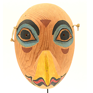 carved wooden mask in the form of an eagle