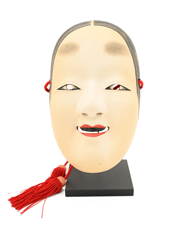 wood mask with a white face